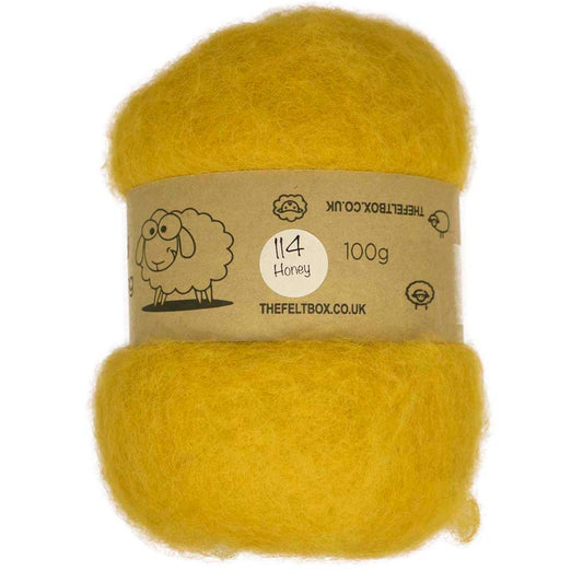 A batt of yellow carded wool batting for crafting, labeled with the number 114 and the felt box branding details.