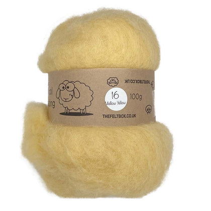 A carded wool batt in a natural yellow color, displayed on a card with product information.