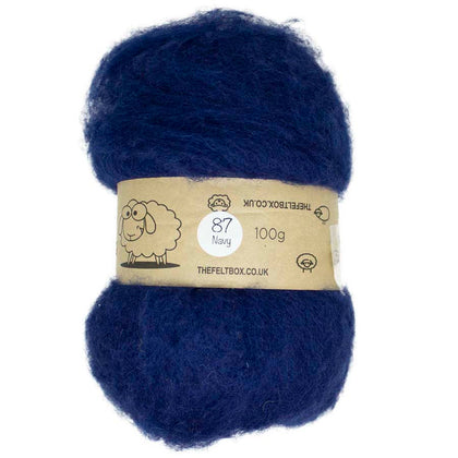 A carded navy blue wool batt for needle felting, displayed on a card with a label indicating its weight is 100g.