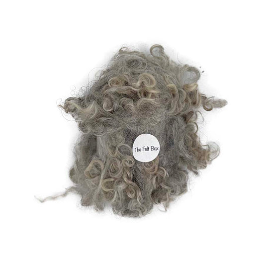 28g pack of natural light grey curly wool locks with The Felt Box band