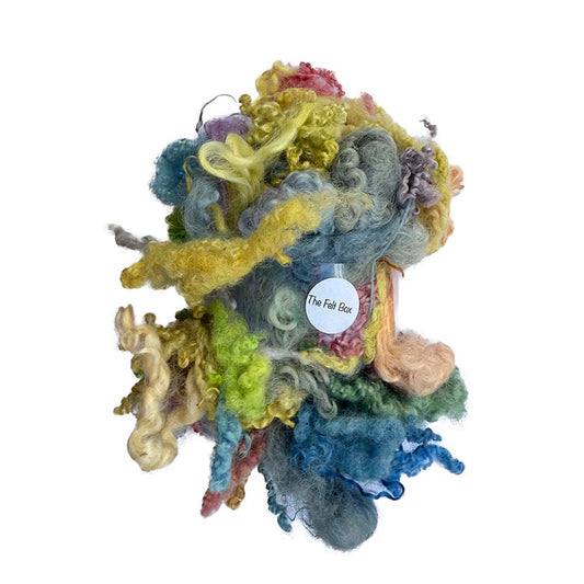 50g hand-dyed curly wool locks from Wensleydale and Bluefaced Leicester sheep – ideal for needle felting, spinning, and fibre art. The Felt Box UK