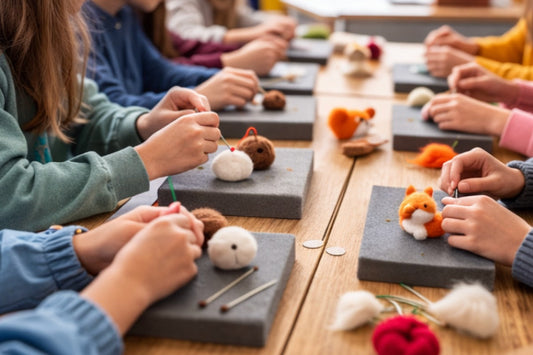 A group of people needle felting in a workshop