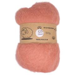 A carded pink wool batt weighing 100 grams, with a sheep design and the brand name 'The Felt Box'.