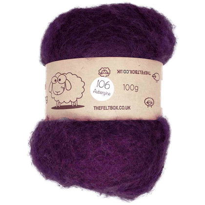 A batt of carded wool in aubergine purple color, packaged with a label that includes the brand name 'The Felt Box' and the weight of 100g.