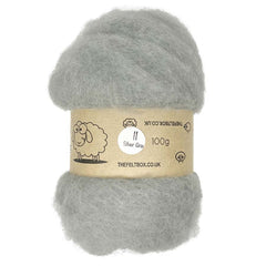 A carded bundle of silver grey wool batting, packaged with a label indicating it is 100% sheeps wool and weighing 100g.