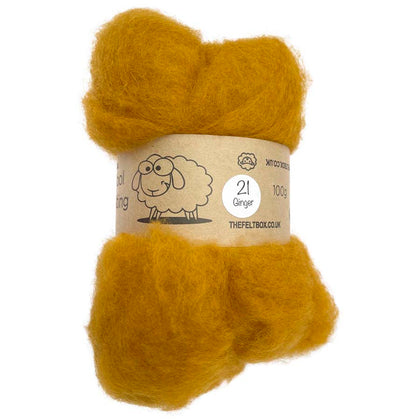 A carded wool batt in a ginger color, displayed in a cylindrical shape with a label showing the brand and product details.