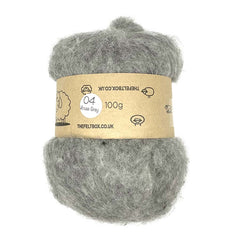 A bundle of carded wool batting in medium grey, speckled with darker grey, labeled as 'Mouse Grey #04' and weighing 100g.