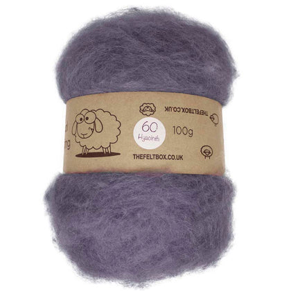 A batt of carded, hyacinth-colored wool displayed on a card with a label that includes the weight of 100g and indicates it is used for needle felting.