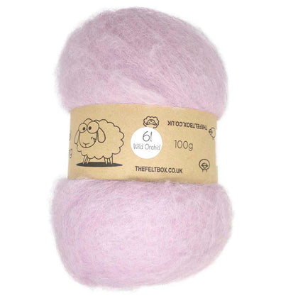 A batt of carded, pink wool fiber displayed on a card with a label that includes the brand name 'The Felt Box' and the product details.