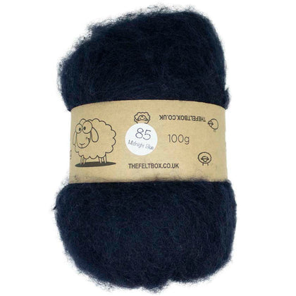 A carded bundle of midnight blue wool 