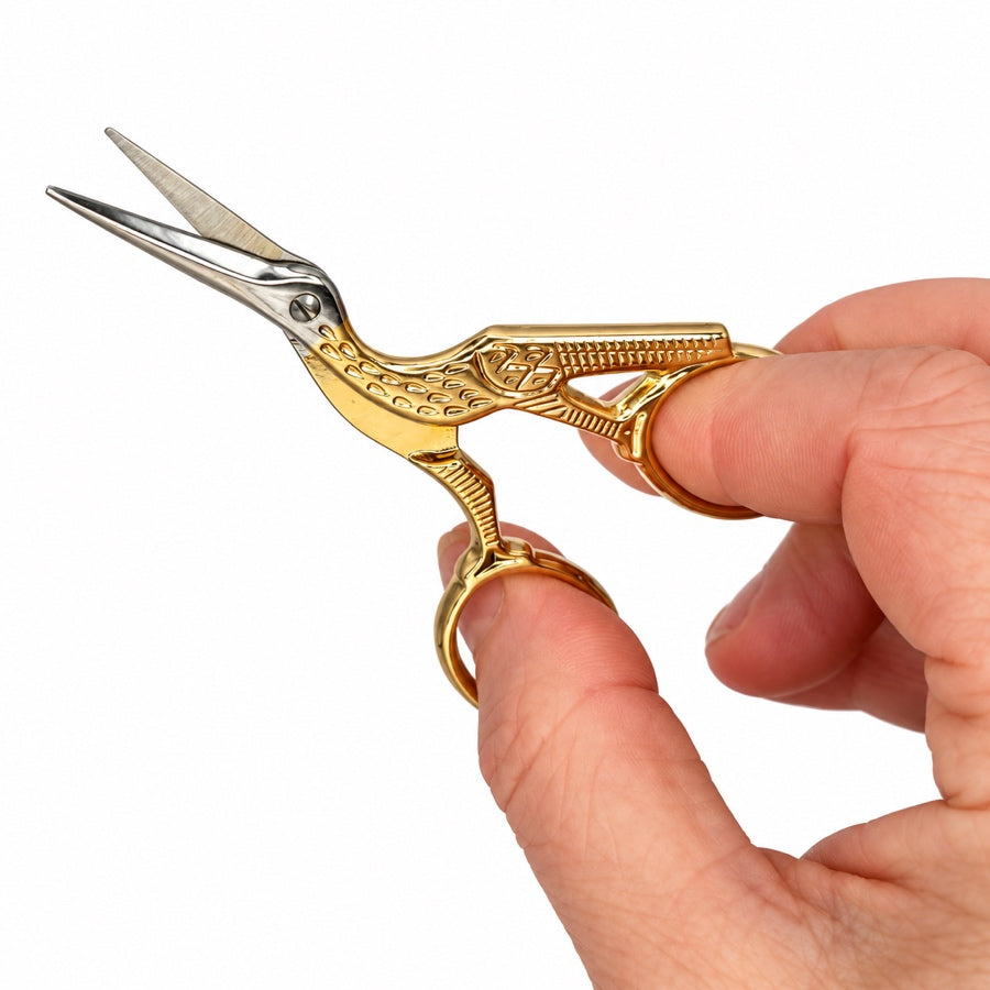Madeira gold stork embroidery scissors open in hand, The Felt Box
