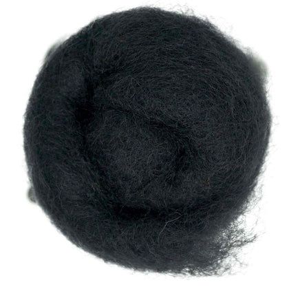Seal – Dark grey-black shade of Maori carded wool with subtle purple undertones. 100g wool roving for needle felting, wet felting, and fibre art. Works well as a base fibre, dense core, or bold finishing layer.