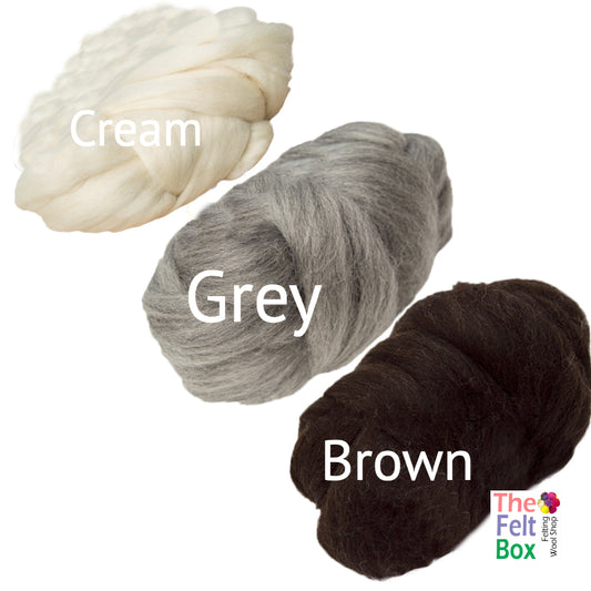 Three skeins of Corriedale wool top in cream, grey, and brown colors, displayed separately with labels.