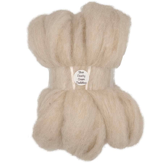 A beige pale skin tone carded sliver needle felting Corriedale fibre bundle.